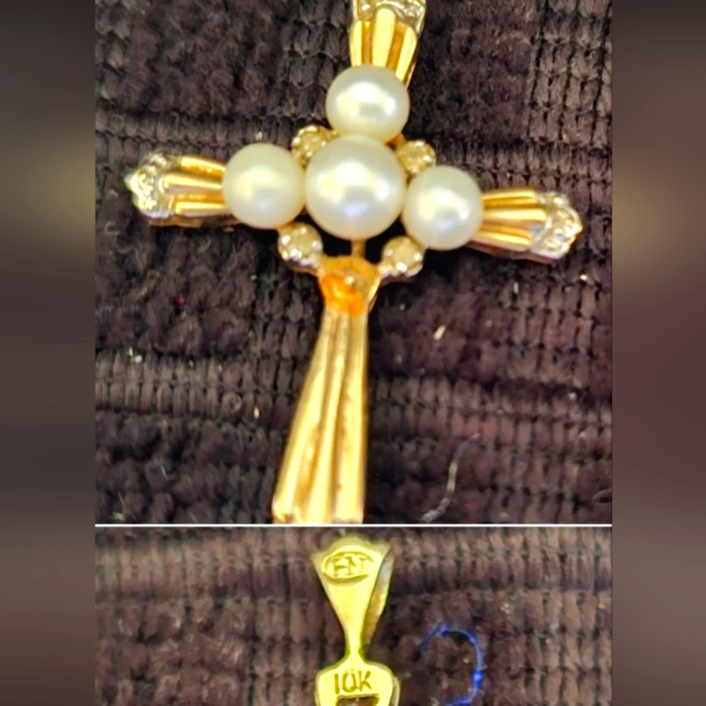 10k gold cross with adornment of pearls pendant.